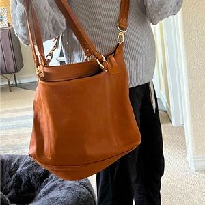 SANCIA shoulder bag or crossbody bag. Brown leather purse in mint condition.